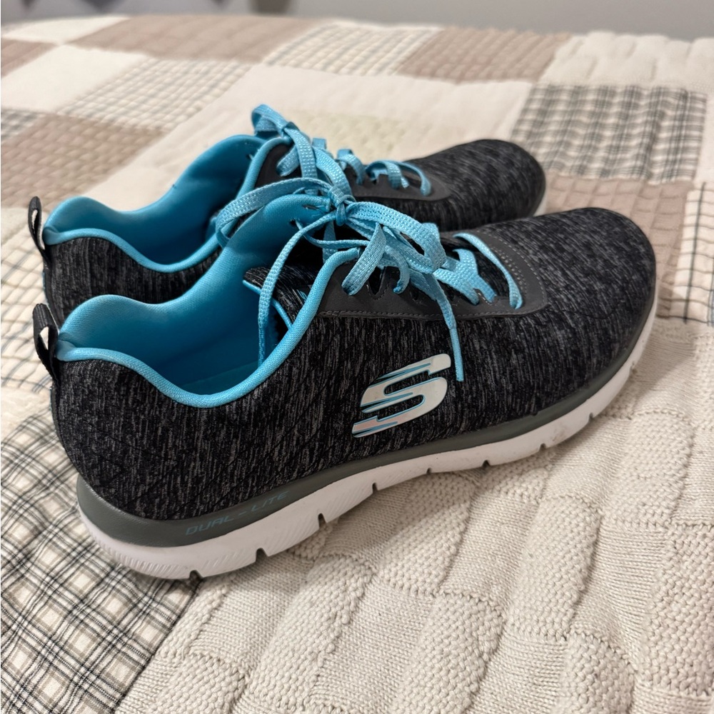 Skechers Black and Blue Sneakers with Sporty Knit Design